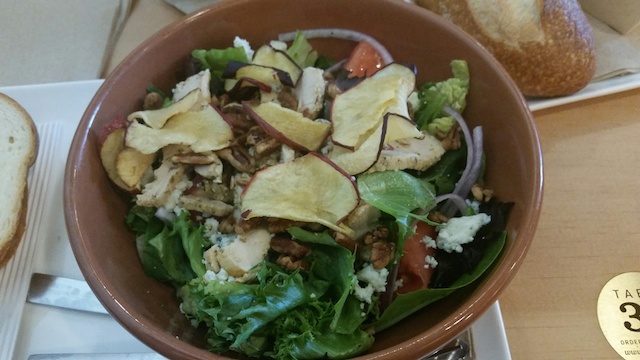 A Fuji Apple Chicken Salad topped with apple chips. This is delicious and healthy.
