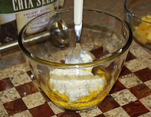 using an immersion blender to combine the cottage cheese and flaxseed oil thoroughly