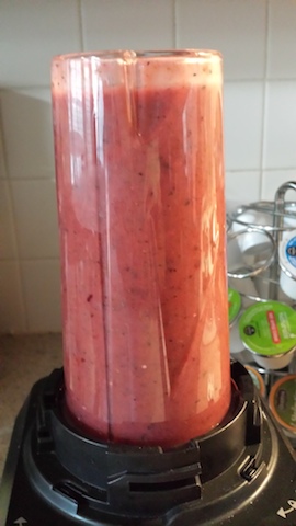 jennifer's smoothie looks pink and delicious in the blender container