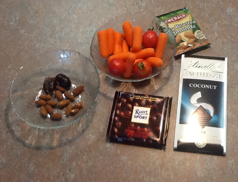almonds and dark chocolate and dates carrots and tomatoes are healthy snacks