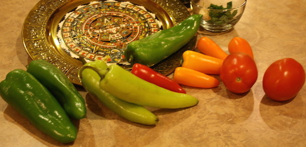 vegetable nutrition includes bright colorful green, red and orange peppers and tomatoes.