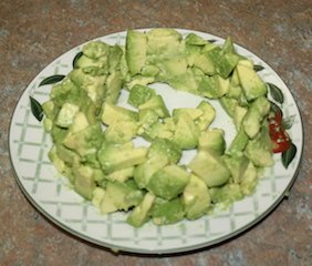avocados made into a walled ring container for a salad