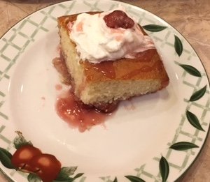Cheating on your diet? This cherry cake casserole is delicious. Served with cream, but no frosting makes it a little healthier.