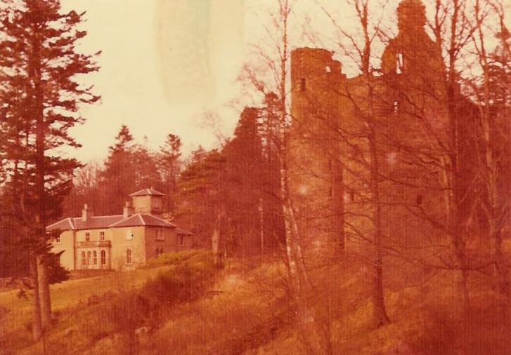 You can see the ruins of an ancient castle in through the trees.