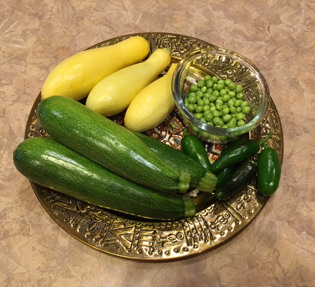 Colorful vegetables from my backyard garden. The peppers got picked a little soon I think.