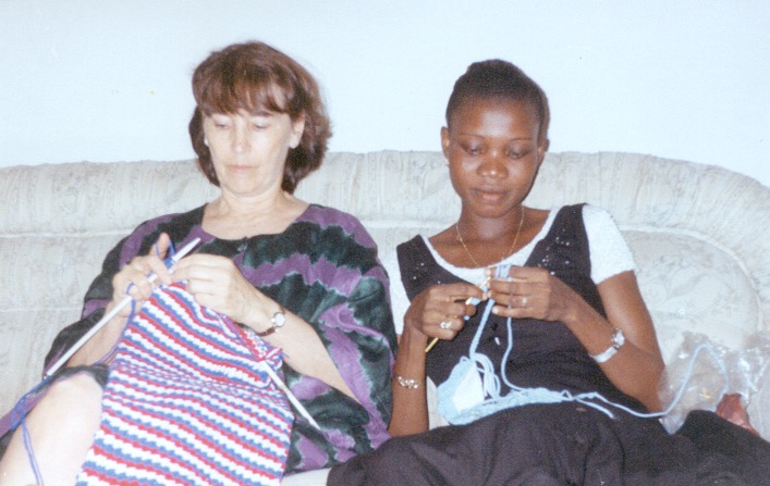 Grace learning to crochet--and doing very well