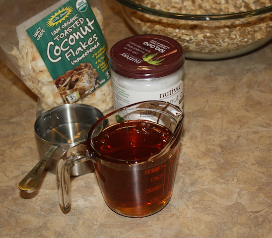 coconut and liquid ingredients ready to be blended to pour on dry granola ingredients