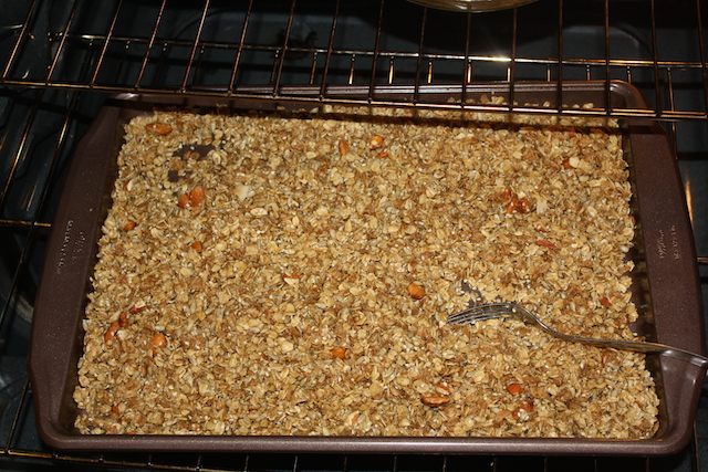 granola in the oven needs to be stirred with a fork occasionally