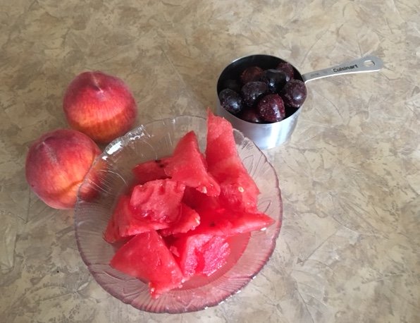 Yummy watermelon, cherries, and peaches