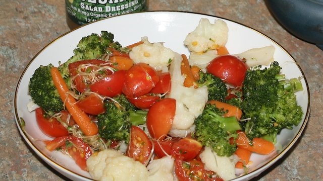 broccoli, cauliflower, and carrots lightly steamed and tossed with tomatoes.